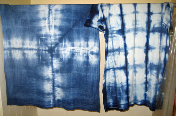 Two shibori pieces rinsed and hung to dry