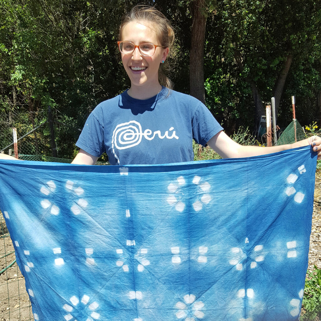 a cloth decorated with areas of white on a blue background